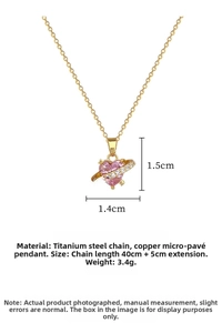 Detail view of heart planet pendant with pink zircon and size measurements in cm