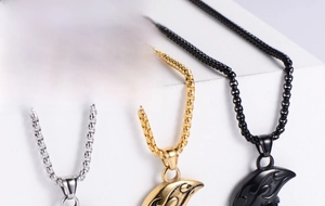 Detailed view of punk retro moon pendants in silver gold and black titanium steel finishes