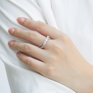 Detailed close-up of S925 silver bow ring featuring oval and round zircon stones