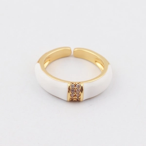 Detail of gold plated open ring with white enamel coating and micro-set zircon stones