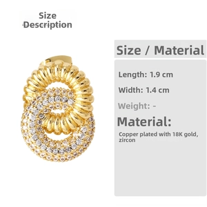 Detail of 18K gold plated double layer earrings with zircon and rope texture