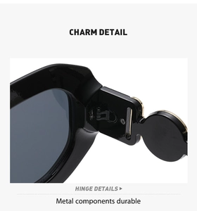 Detail of robust metal hinge and stylish decorative buckle on black square sunglasses