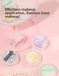 Detail of colorful marble-pattern finger puffs with satin ribbons and clear cases