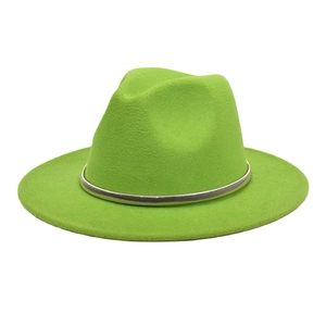 Detail of neon green wool fedora hat featuring a stylish silver metal chain trim accent