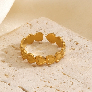 Minimalist 18K gold plated heart ring with adjustable open band on textured stone