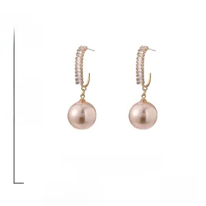 Detailed specs of gold pearl drop earrings with cubic zirconia and S925 silver needles