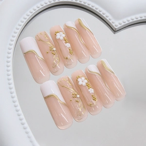 3D golden daisy press-on nails with white French tips and gold bead accents