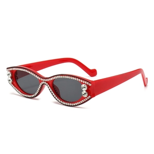 Fashion red rhinestone sunglasses for women with cat-eye frames and gray lenses