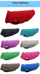 Matrix display of nine colorful fleece dog vests with integrated metal D-ring leash attachments