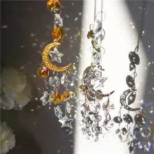 Macro detail of crescent moon suncatcher with colorful crystal beads and metal stars