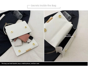 Close-up of white crossbody bag interior showing spacious main pocket and gold chain