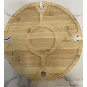 Detailed top view of a portable bamboo wine table with glass holders and snack compartments