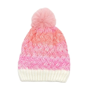 Detailed knit texture and soft pompom of a warm gradient winter beanie for kids