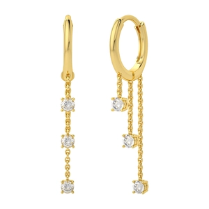 Macro detail of gold S925 silver dangle earrings with three sparkling round zircons
