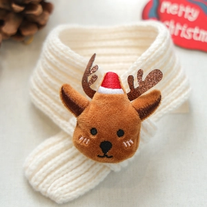 Detailed view of cream knit Christmas pet scarf with a cute plush reindeer decoration