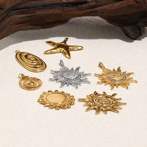 Selection of stainless steel sun and moon charms in gold and silver finish with rhinestones