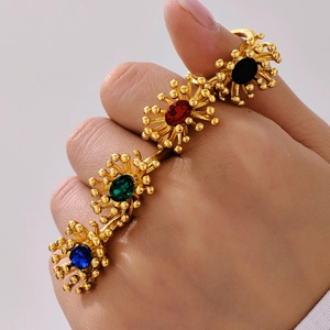18K gold plated ring with four-color gemstones and intricate branch design details