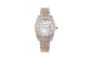 Detail of crystal encrusted Roman numerals and calendar window on silver rose gold watch