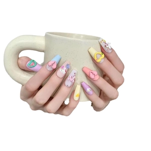 Handmade dopamine colorful macaron press-on nails with 3D hearts and bows in coffin shape