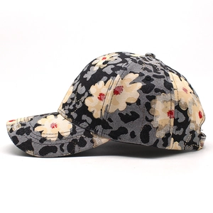 Detail view of floral and leopard print pattern on high-quality canvas baseball cap