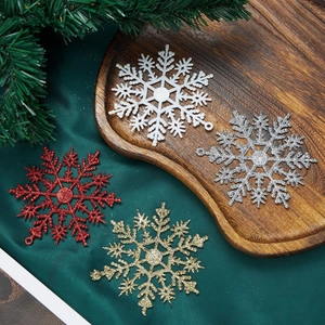 Glitter snowflake ornaments in gold silver red and white for Christmas tree decor