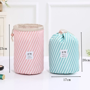 Floral cylinder travel makeup storage bags with drawstring closure in two sizes