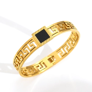 Bracelet luxueux en acier inoxydable doré 18 carats avec motif grec et insert noir