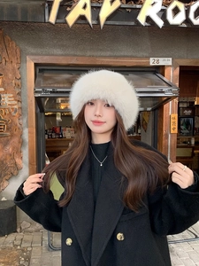 Close-up of white fluffy faux fur bucket hat texture and premium plush material quality