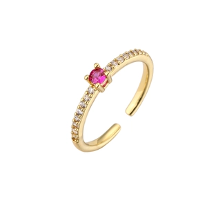 Adjustable gold ring with a pink crystal and sparkling white pavé set zircons