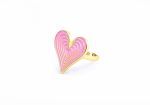 Macro detail of 18K gold-plated ring featuring pink gradient enamel heart design
