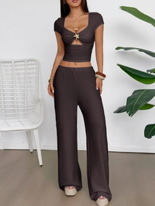 Elegant dark brown ribbed knit two-piece set with starfish detail and wide leg pants