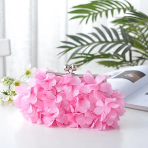 Pink floral clutch bag with textured fabric petals and a silver spherical clasp closure