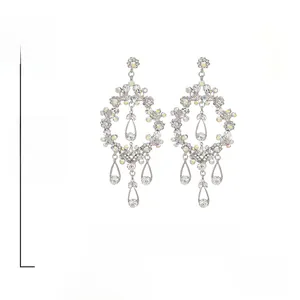 Size and material detail of silver drop earrings with floral rhinestones and 925 silver needles