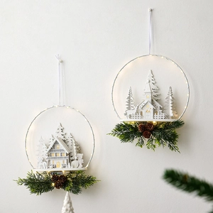 Nordic Christmas door hanging with white castle and reindeer motifs featuring warm LED lights