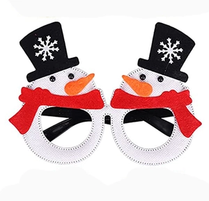 Detail of Christmas snowman glasses with black hats and red scarves for festive parties