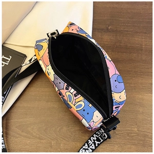 Detailed interior of a cartoon rabbit crossbody bag with vibrant prints and lettered strap