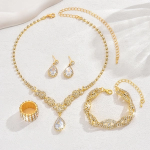 Detailed view of bridal jewelry set with sparkling rhinestones and drop-shaped necklace