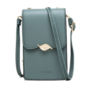 Close-up of teal PU leather crossbody bag featuring a golden leaf buckle and logo