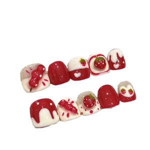 Handmade strawberry press-on nails set with 3D red and white resin designs for girls