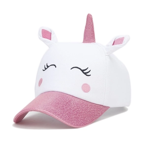 Detail of kids baseball cap showing pink glitter unicorn horn and embroidered eyelashes