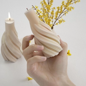 Minimalist spiral twisted art candle in cream beige finish for DIY home decor styling