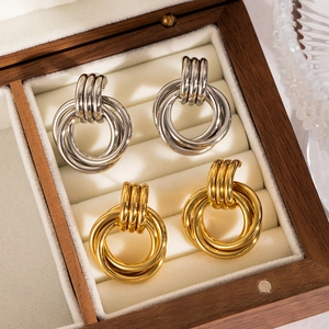 Chic multi-layer round triple-loop hoop earrings in gold and silver stainless steel finishes