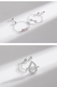 Detail of adjustable S925 silver chain ring with pink zircon bow and teardrop accents