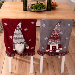 Festive Christmas gnome chair back covers in red and grey with 3D plush gnome appliques