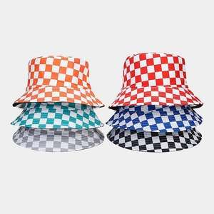 Detailed grid view showing six color options of reversible checkerboard bucket hats
