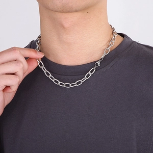 Chic titanium steel link chain necklace with threaded design worn by a model