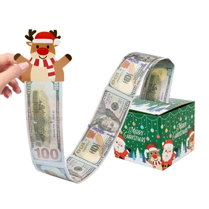 Green Christmas money pull box with reindeer handle and Merry Christmas text