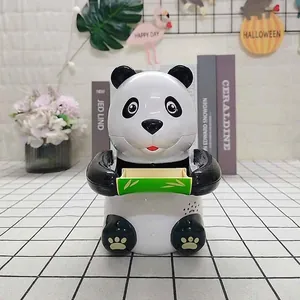 Detailed view of automatic panda coin bank with green bamboo tray and sound speaker