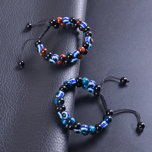Double-layer braided Evil Eye bracelet with Tiger Eye stones and black beads on leather