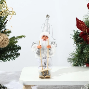 Detail of silver Santa Claus doll with wooden skis and fabric hat for Christmas decor